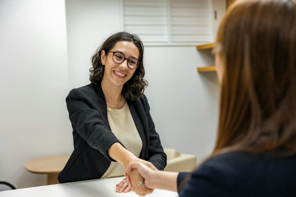 A firm handshake is a sign to have more confident body language